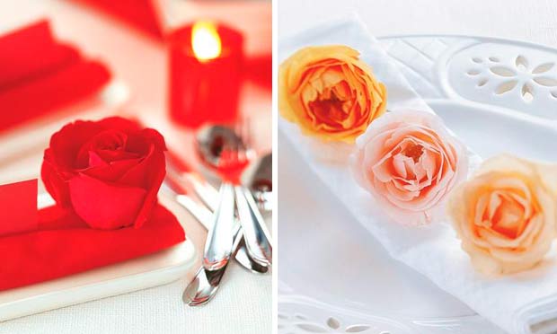Rosa vermelha e rosas enfeitando o guardanapo Rosa vermelha e rosas enfeitando o guardanapo