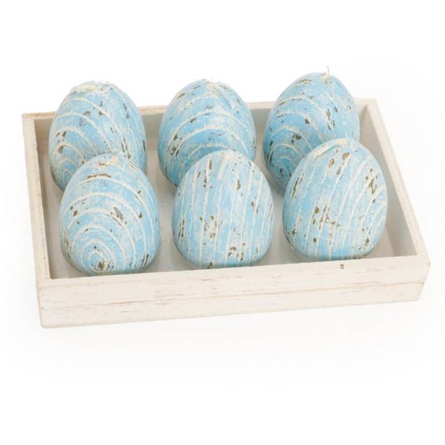 Vela rústica Ovo de Páscoa, Cromus, de cera (4 x 7 cm). <a href="https://www.magazineluiza.com.br/vela-rustica-ovo-de-pascoa-decoracao-festa-6-unid-azul-cromus/p/5278418/am/vepa/" target="_blank" rel="noopener">Magazine Luiza</a>, R$ 56,90 a caixa com seis Vela rústica Ovo de Páscoa, Cromus, de cera (4 x 7 cm). <a href="https://www.magazineluiza.com.br/vela-rustica-ovo-de-pascoa-decoracao-festa-6-unid-azul-cromus/p/5278418/am/vepa/" target="_blank" rel="noopener">Magazine Luiza</a>, R$ 56,90 a caixa com seis