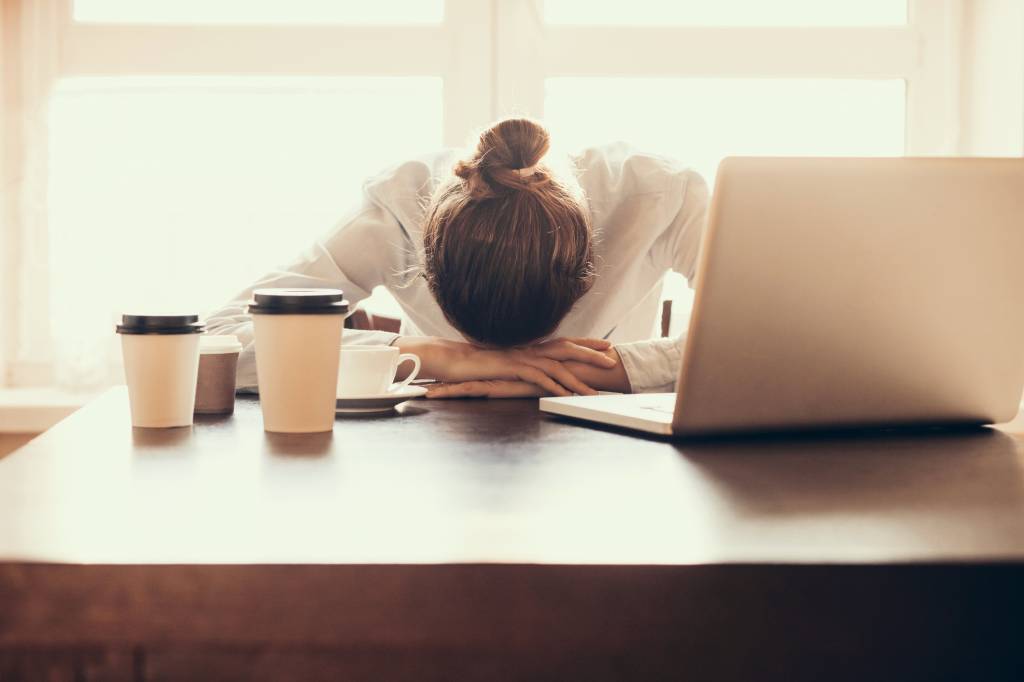 Tired woman in the office