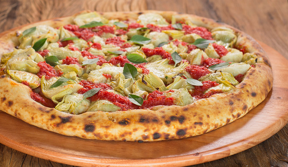 delivery-saudavel-veridiana-pizza-Carciofi Pizza Carciofi, da Veridiana, elaborada com corações de alcachofra italiana, mozarela e molho de tomate fresco