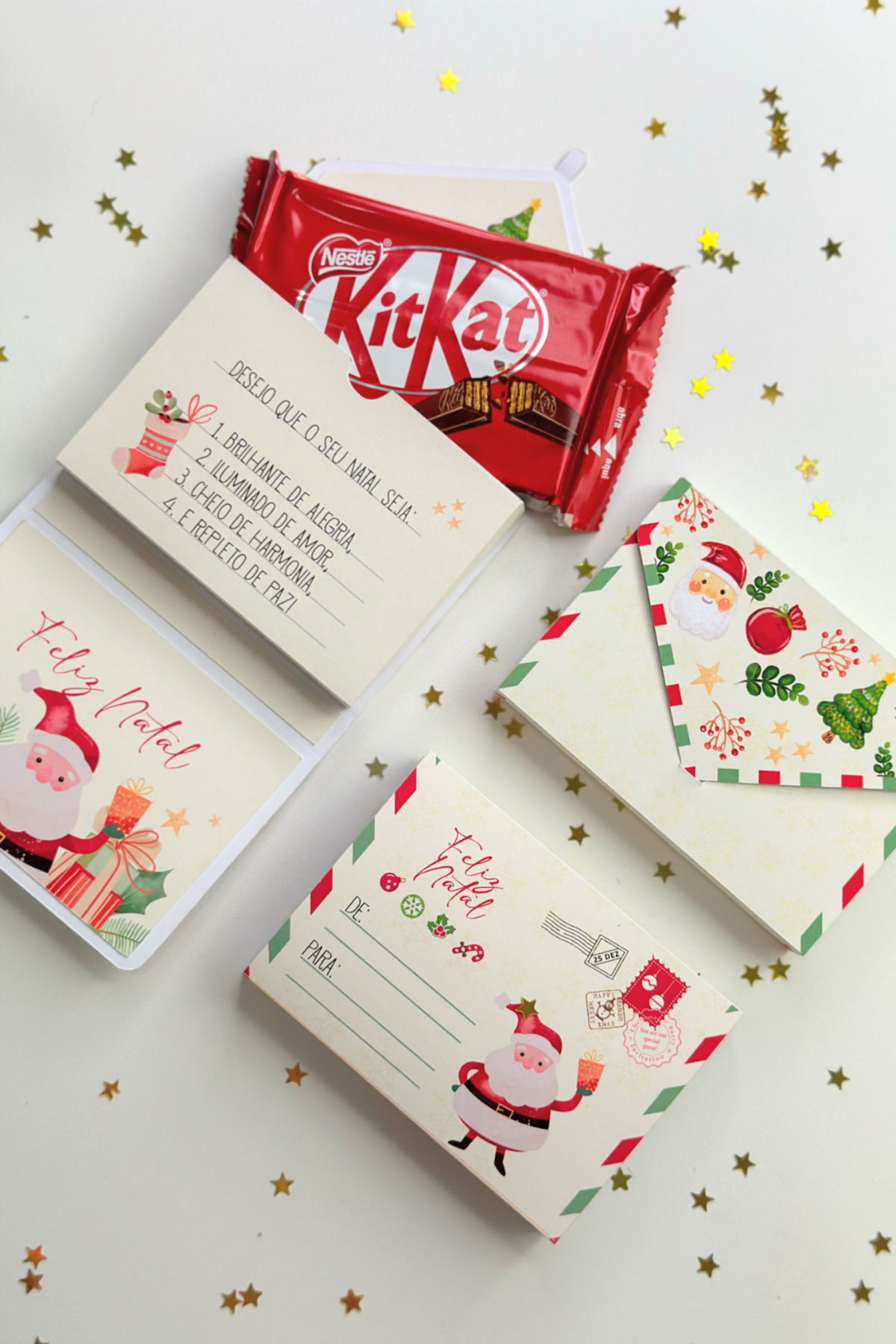 Imagem de lembrancinha para o Natal com carta e chocolate.