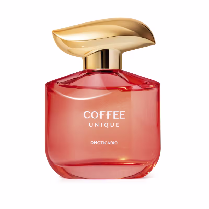 Foto de um perfume com embalagem p&ecirc;ssego e dourada